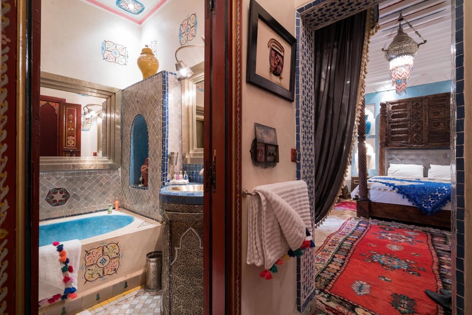 Sharaf Suite | Bathroom | Designer toiletries, hair dryer, bathrobes, slippers