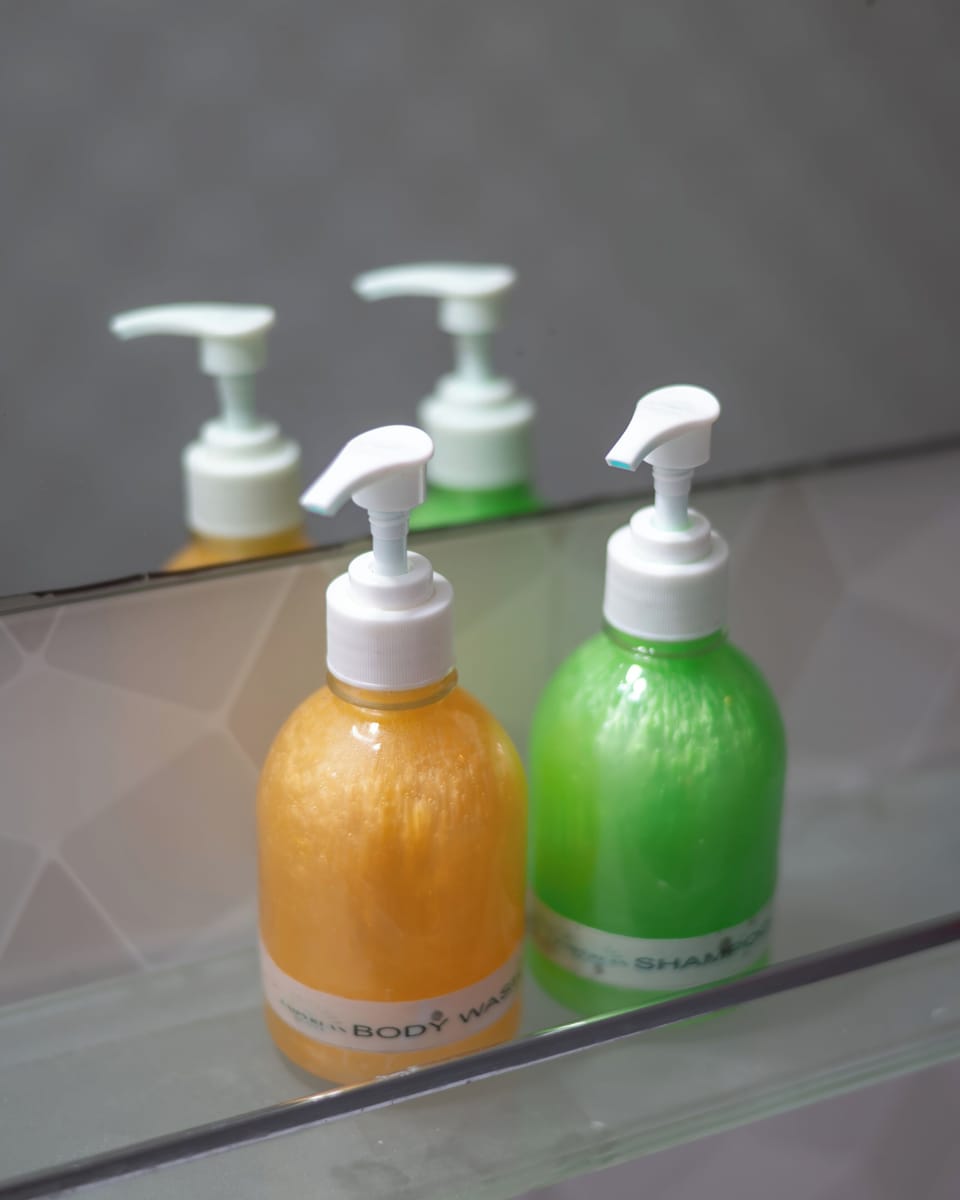 Signature Room, 1 King Bed | Bathroom | Shower, bidet, towels, soap