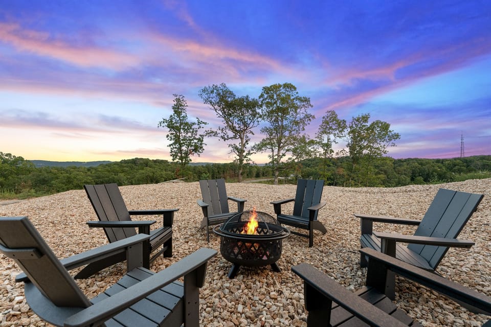 Smore's anyone? Our fire pit area is just a few steps from the back patio. Enjoy some views of Table Rock Lake while you're toasting marshmallows!