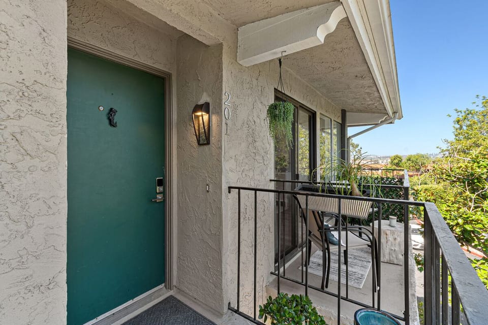 La Costa condo with balcony overlooking fairway - Upper-level entryway for added privacy