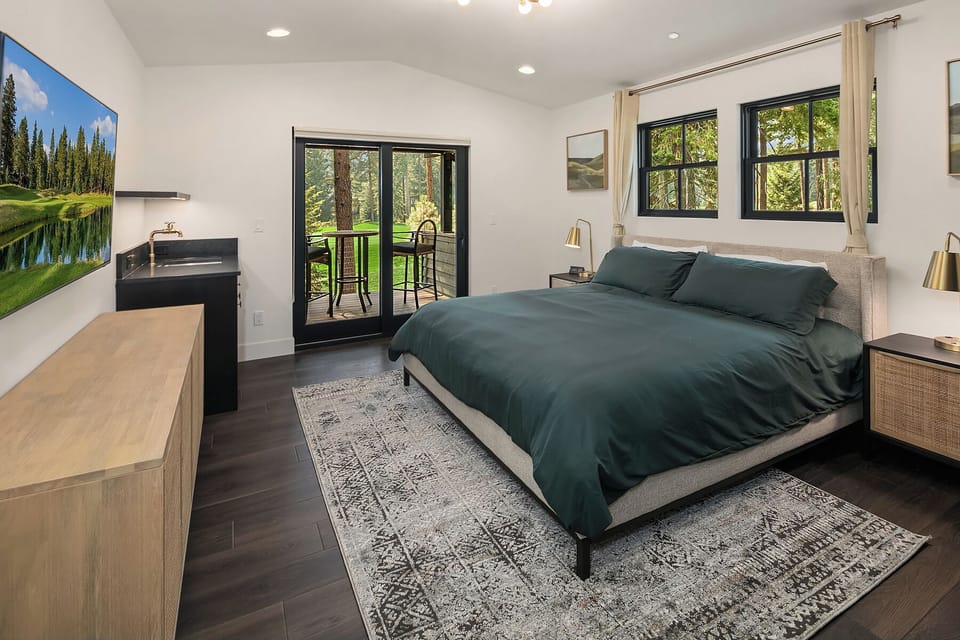 Sweet Spot: - Upper floor master suite with a king bed, smart TV, and a wet bar.