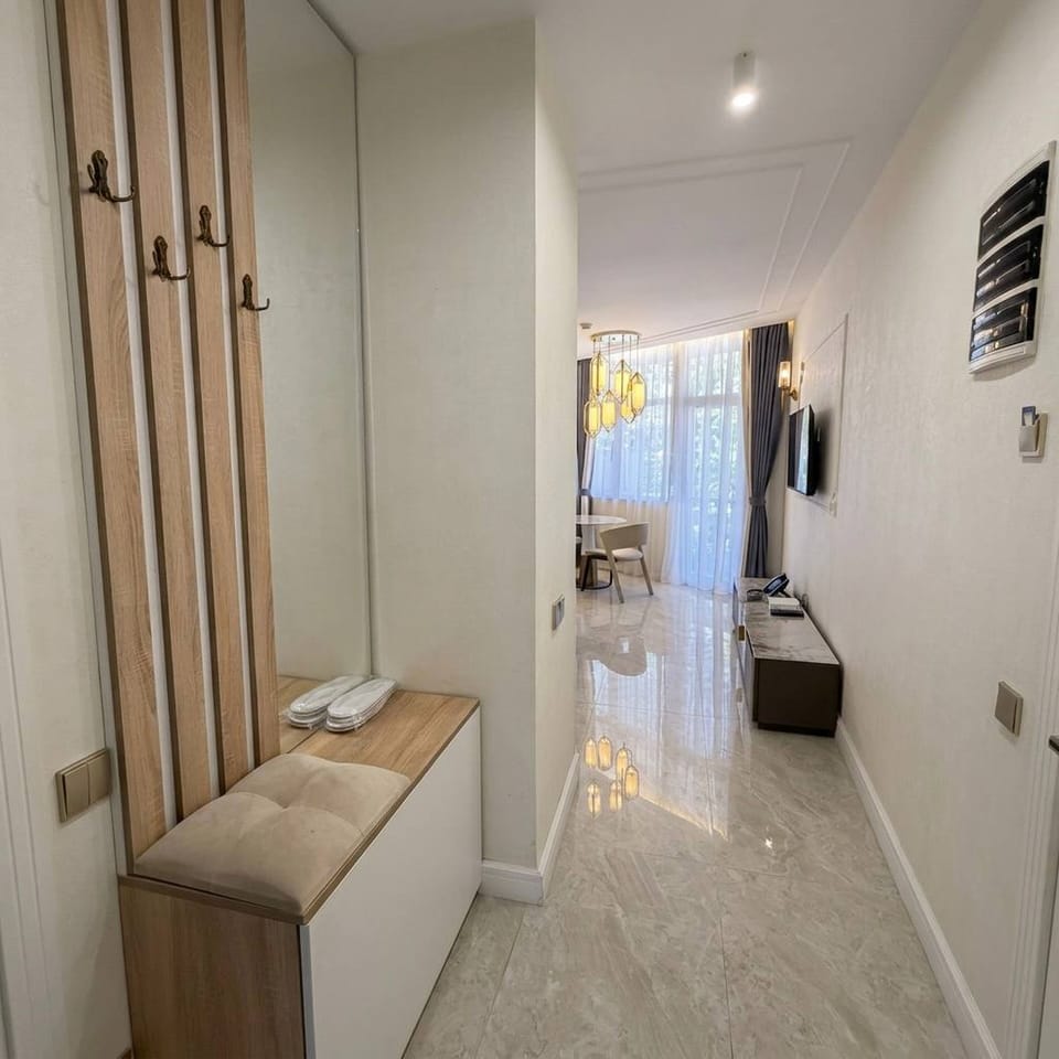 Executive Apartment | Living area | Smart TV, pay movies