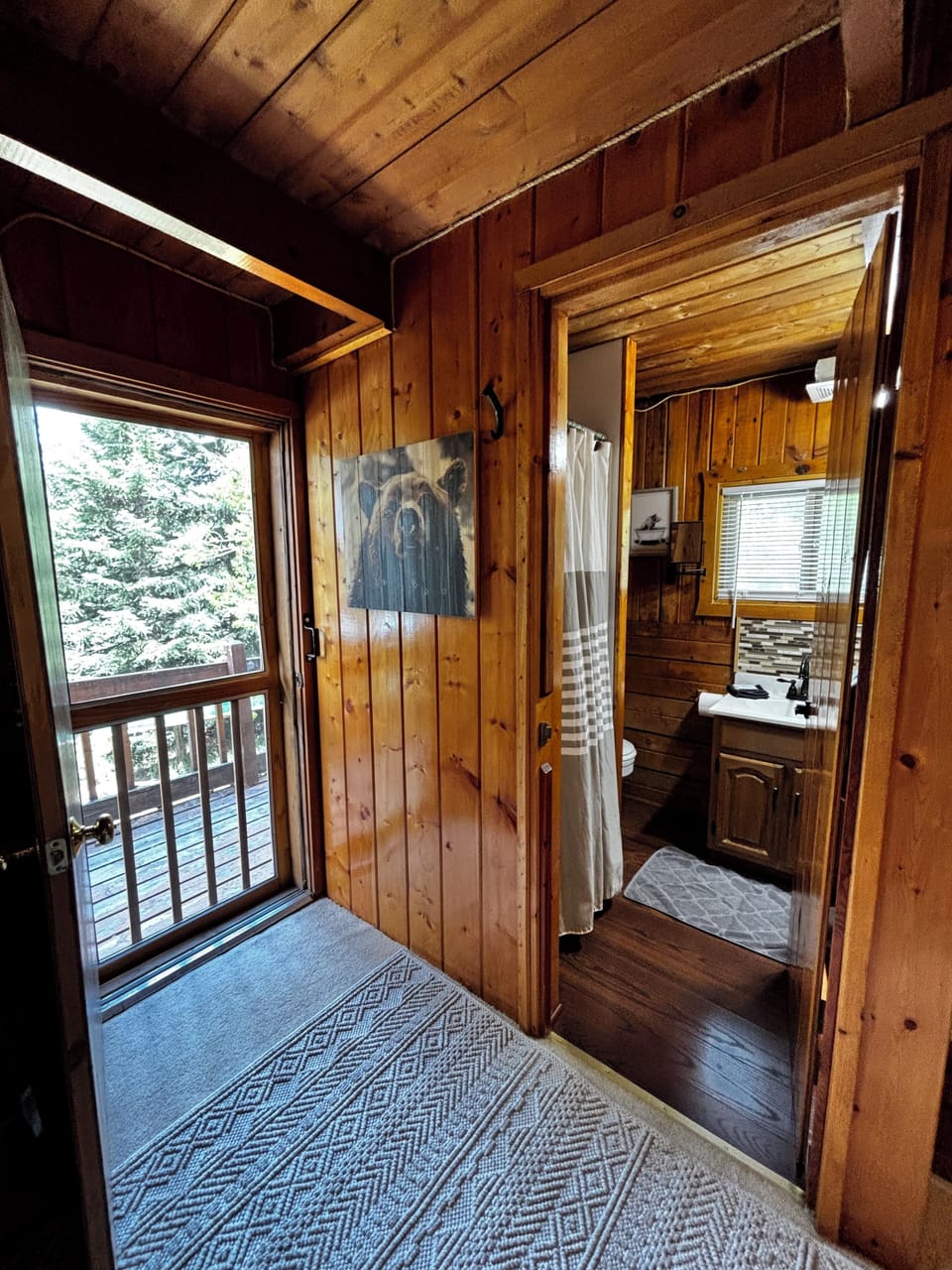 Private back upper patio entrance, and private master bathroom.