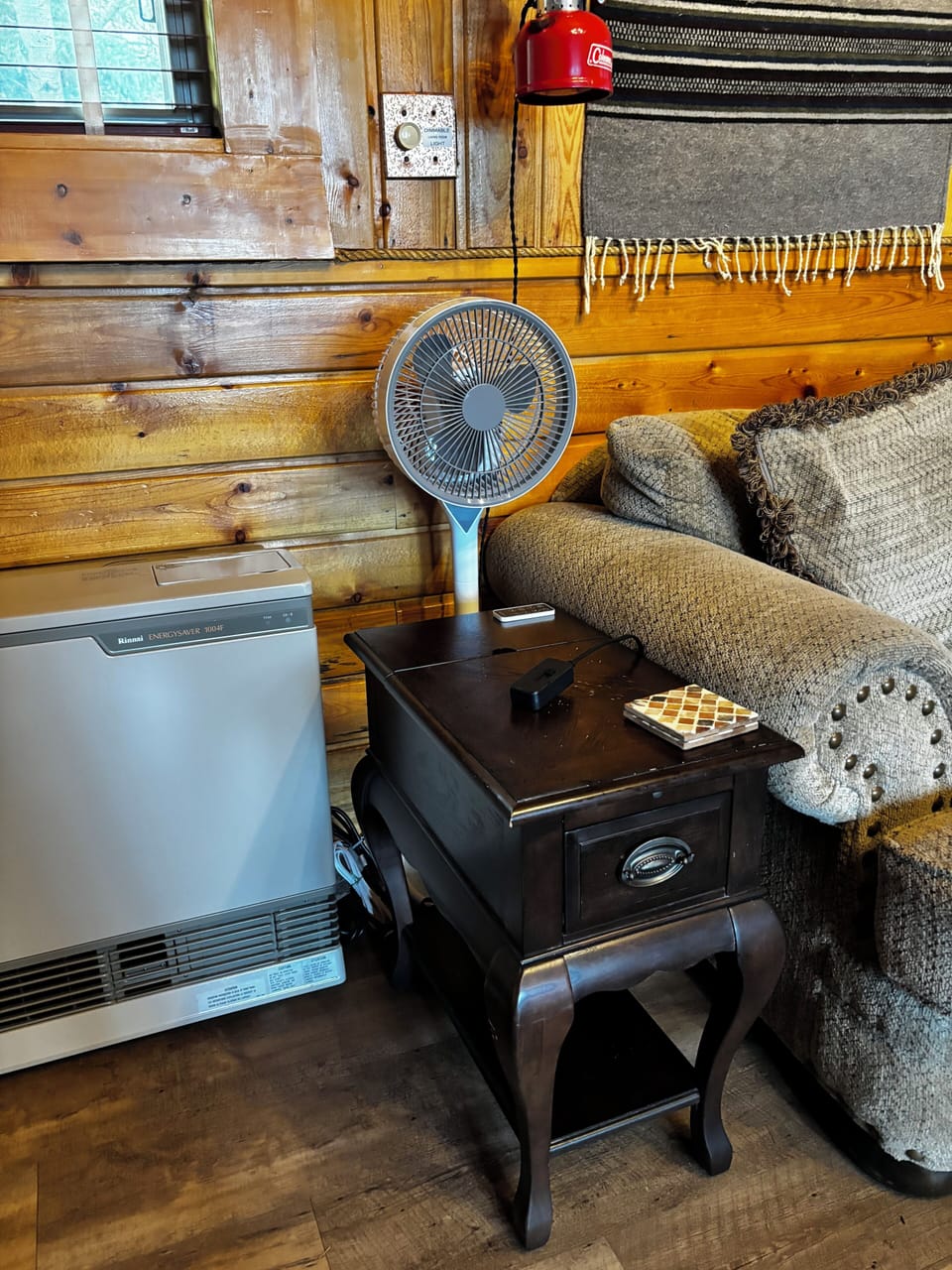 Living Rm: comfortable seating for 9-10, quiet 360 degree fan & antique lanterns