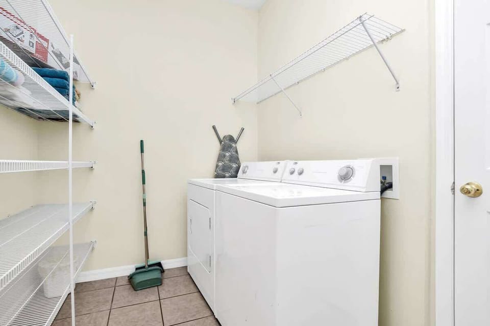 Convenient Laundry Room with Washer and Dryer