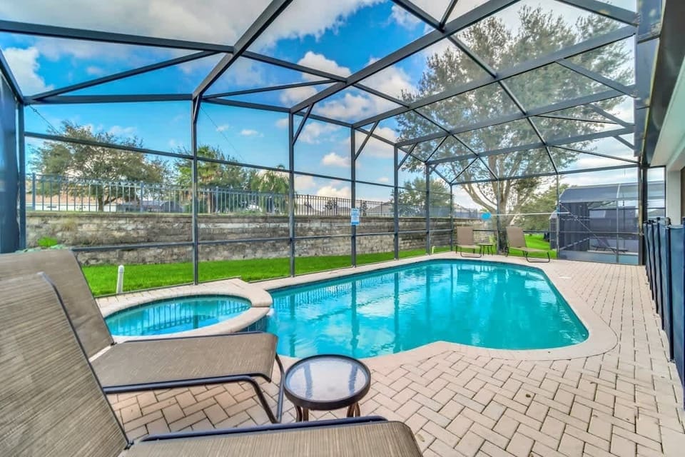 Gorgeous screened pool view — inviting, spacious, and ready for fun.