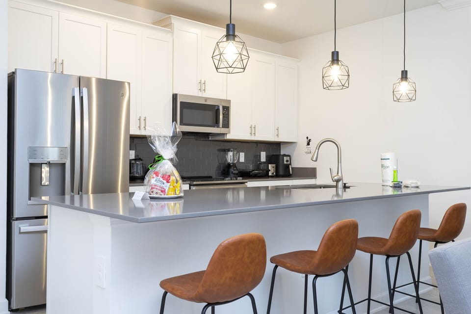 Fall in love for modern luxury with our stunning open kitchen—a beautiful, vibrant space that seamlessly combines style and functionality. a family-friendly retreat where the joy of cooking meets the warmth of togetherness.