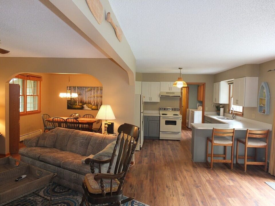 LIVING ROOM:  Looking into the kitchen and dining room from the living room.