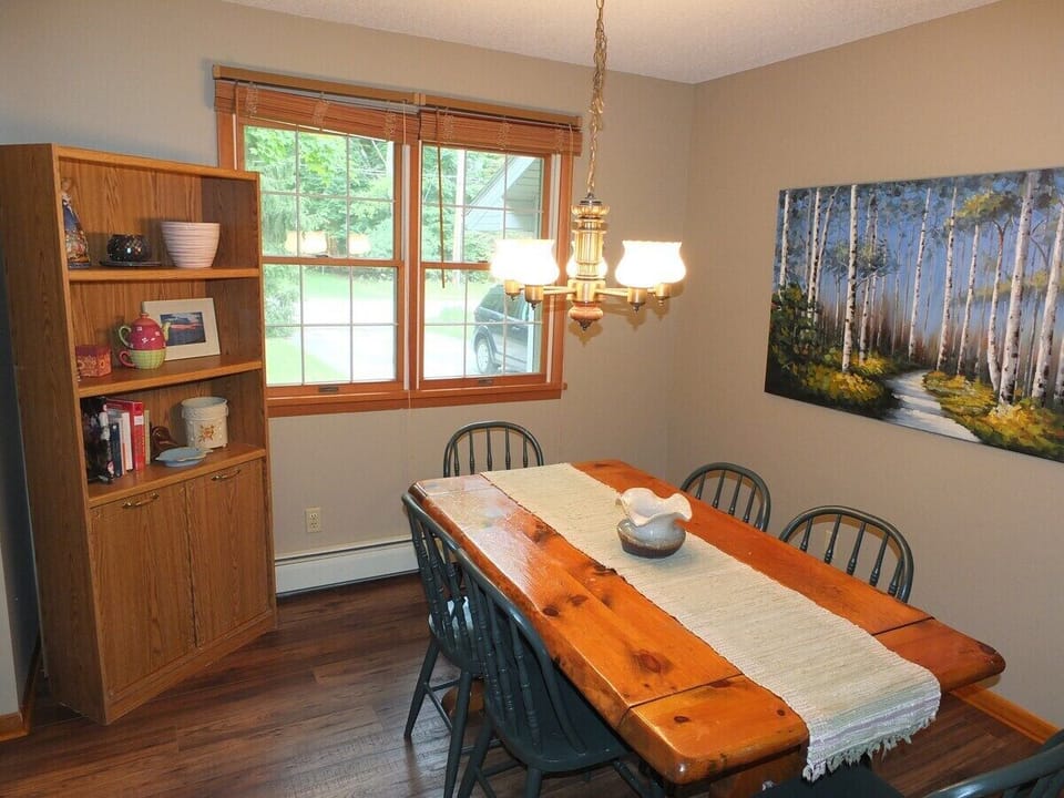 DINING ROOM:  The home has a lovely dining room with table and chairs for 6 adults
