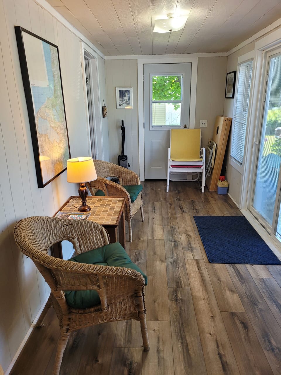 SUN PORCH:  The home has a fully enclosed sun porch with a nice view of Crystal Lake!
