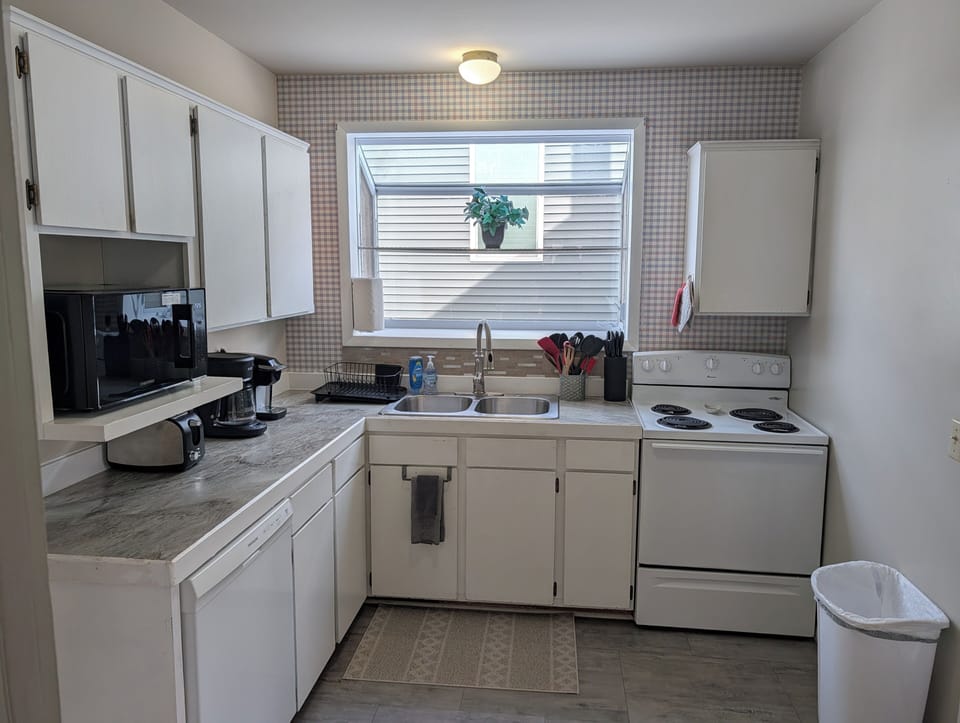 KITCHEN:  Recently updated kitchen with all appliances including a dishwasher and a good supply of cooking and dining utensils.