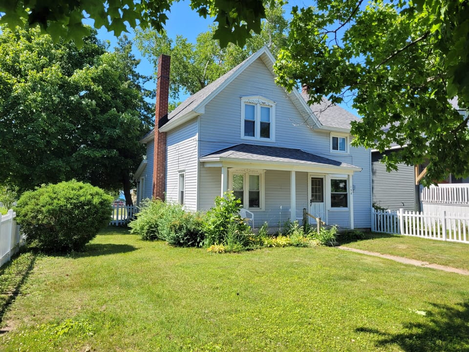 OVERVIEW:  The front yard (that is fully fenced-in) and the front of the house