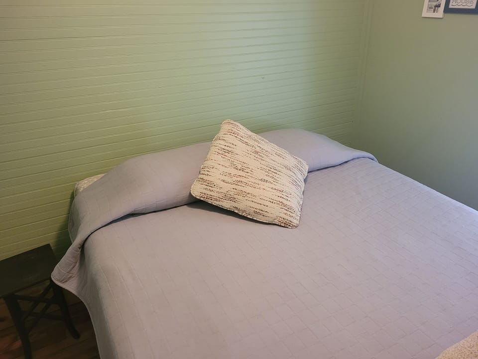 BEDROOM 2:  Features a queen-size bed.