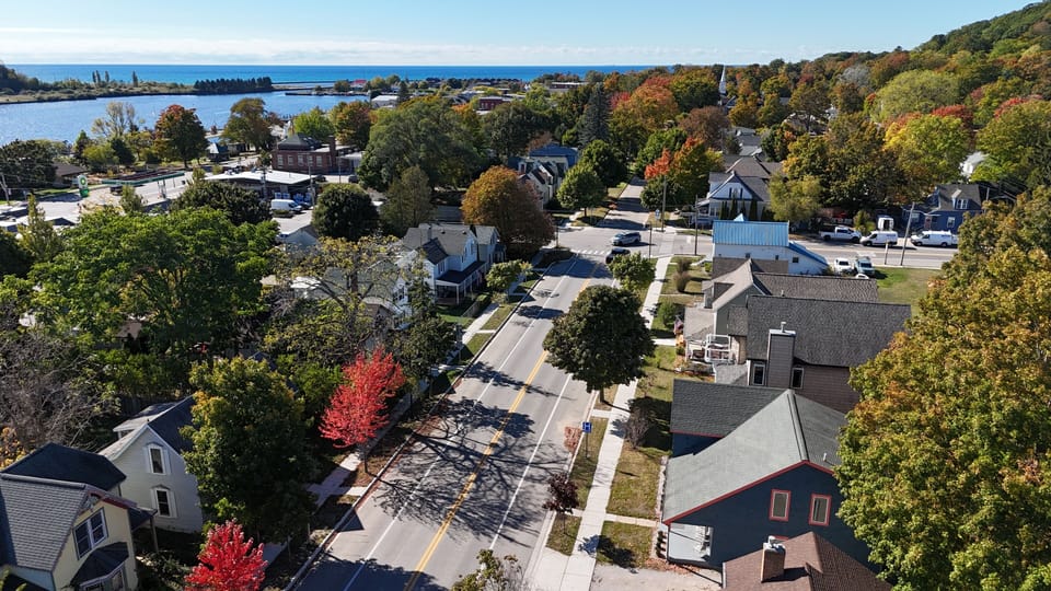 EXTERIOR:  Looking west from above the house towards downtown Frankfort and Lake Michigan