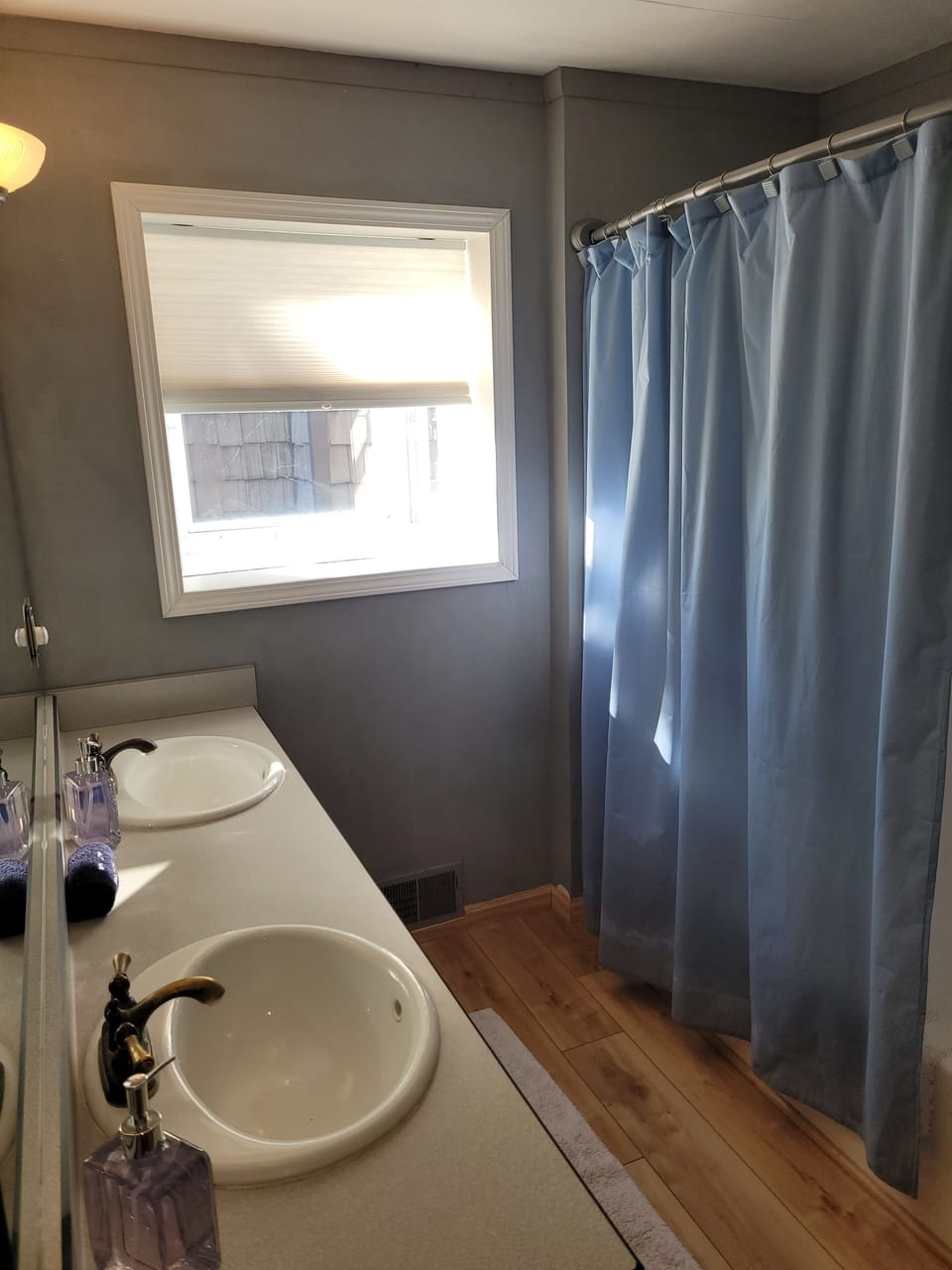 BATHROOM #1 (MAIN FLOOR):  This is a full private ensuite bathroom for Bedroom #1.  It includes a combination tub and shower.