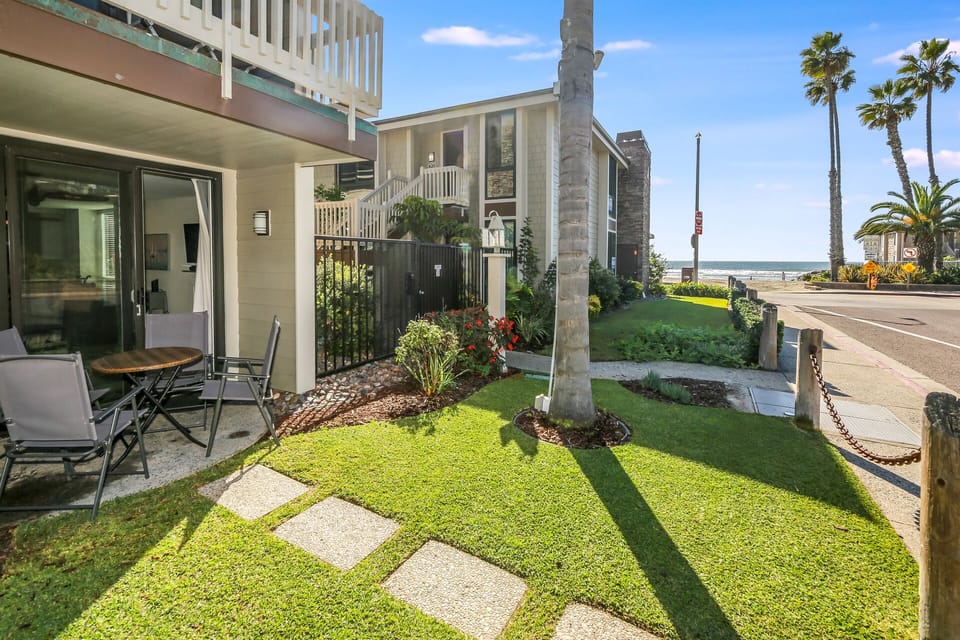 Step onto your patio and take a short stroll to the sandy shores