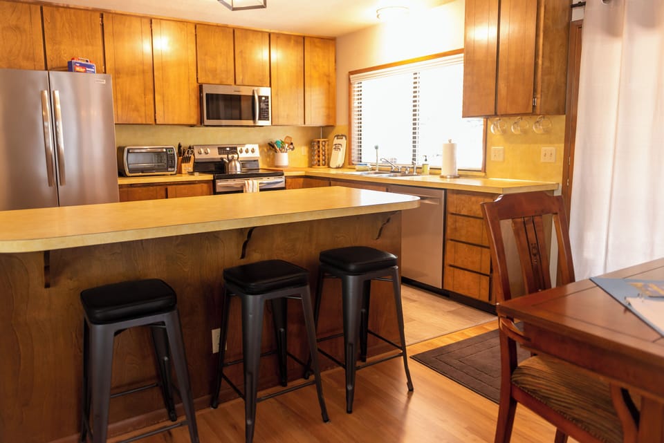 All new stainless appliances.
3 bar stools