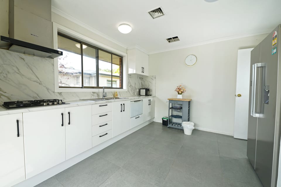 Family House | Private kitchen | Full-size fridge, microwave, oven, dishwasher