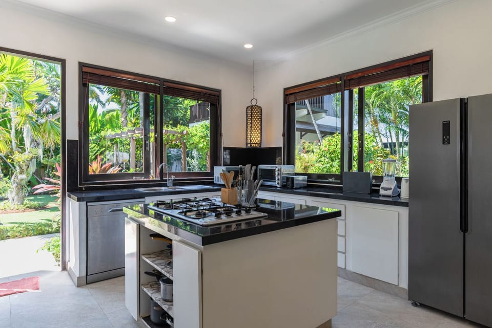 Electric kettle, highchair, cleaning supplies, paper towels