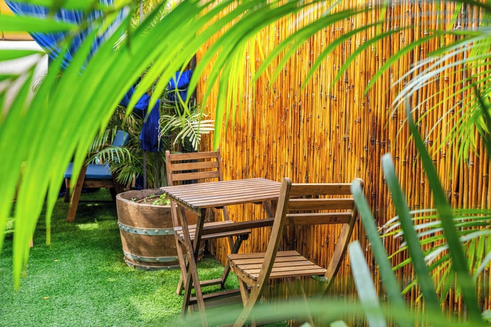 Charming outdoor space with wooden furniture, perfect for morning coffee
