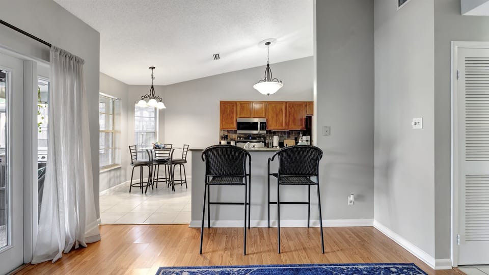 Savor the synergy of design and practicality as you dine in sophisticated comfort.
