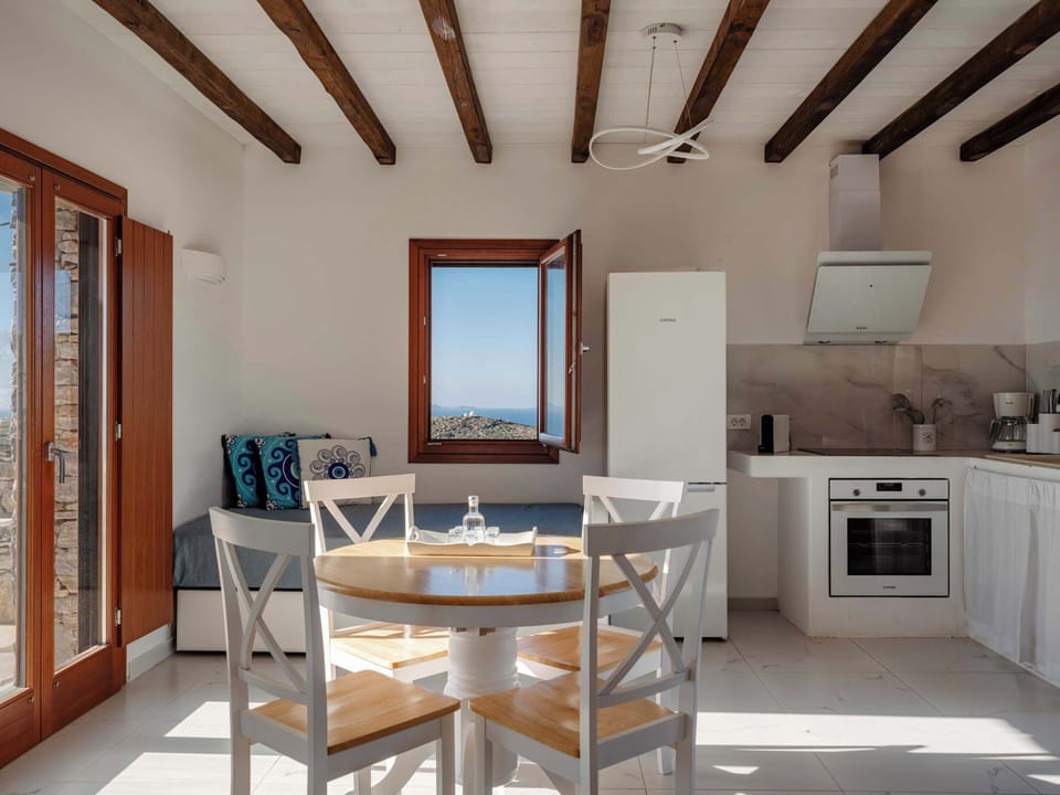 Light-filled dining area within the open-plan space.