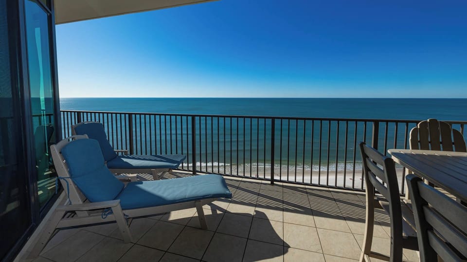 Lounge on your balcony overlooking the stunning gulf coastline and doze to the sound of waves and seagulls
