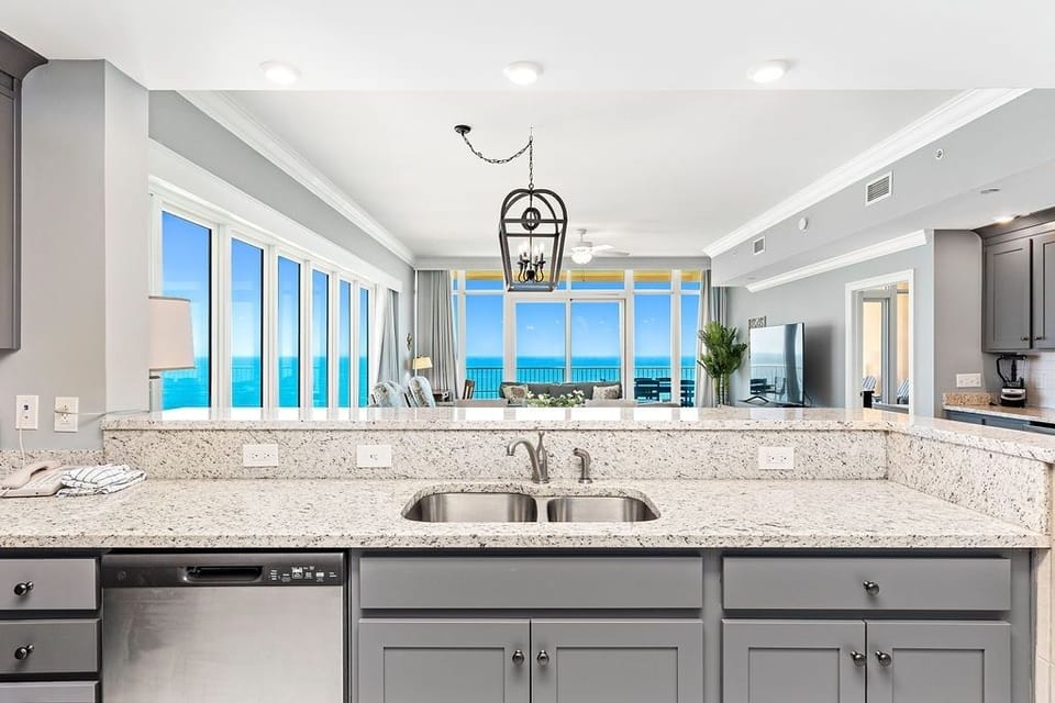 Condo, 4 Bedrooms | Private kitchen | Fridge, oven, coffee/tea maker