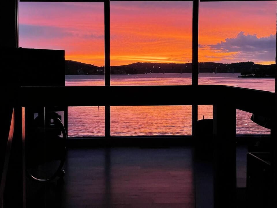 Marvel at the lake panoramic view from the floor-to-ceiling windows
