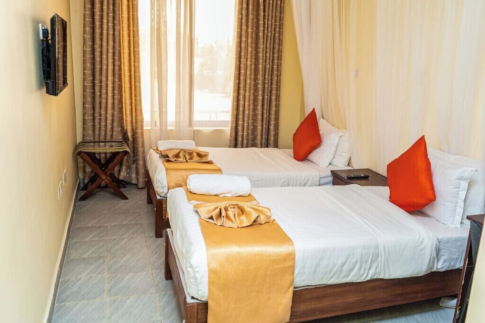 Desk, laptop workspace, free WiFi, bed sheets