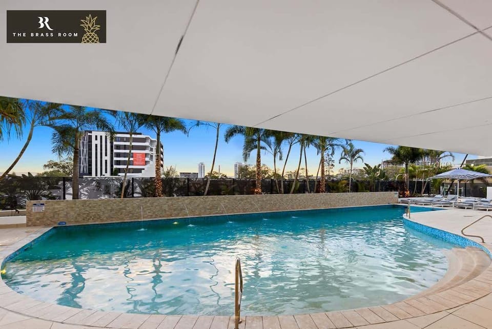 Dive into our inviting pool, its brilliant blue waters set against lush greenery. Relax on a comfortable chair, soak up the sun, and enjoy a tranquil escape.