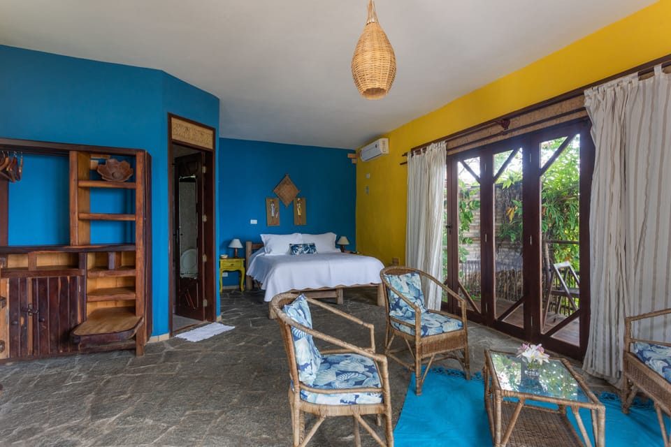 Standard Suite, Ocean View | Minibar, individually decorated, individually furnished, blackout drapes
