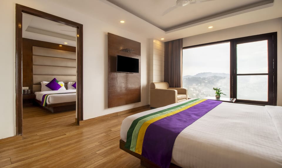 Premium Room | In-room safe, desk, iron/ironing board, bed sheets