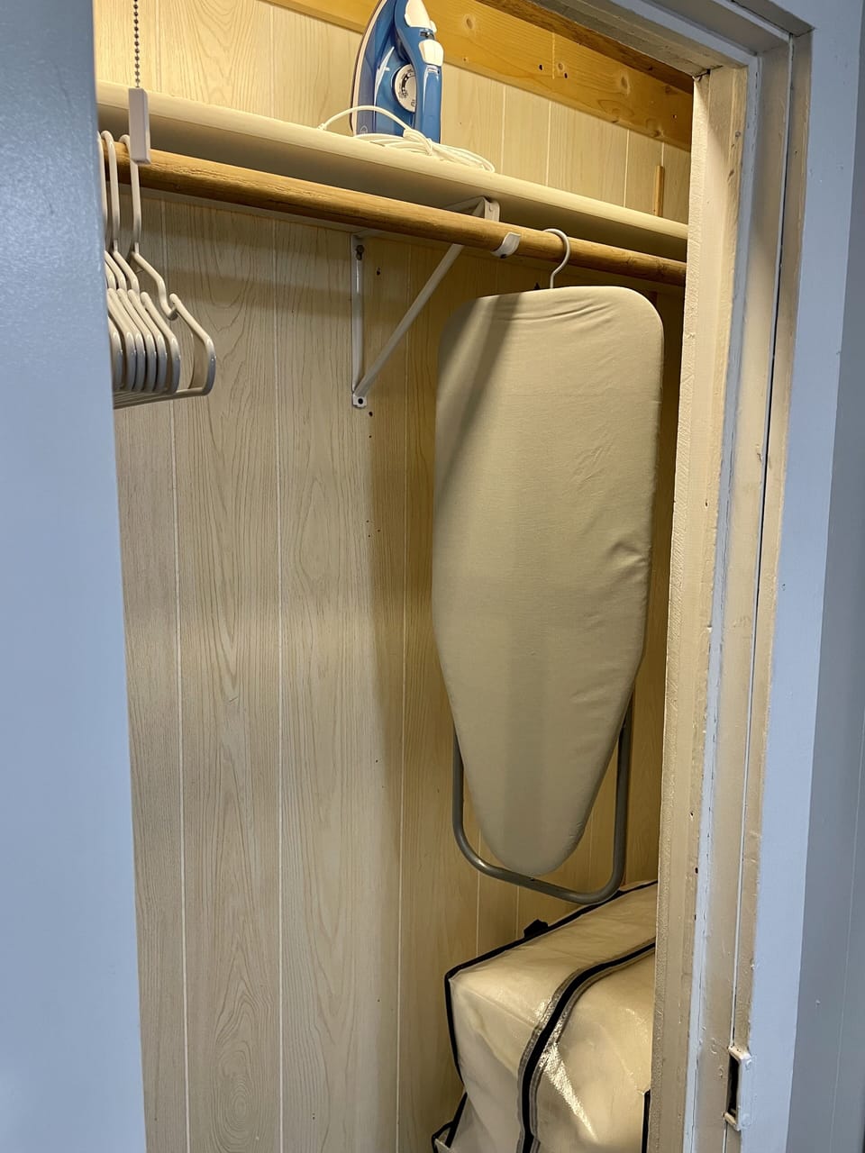 Iron, ironing board and bedding for pullout sofa bed