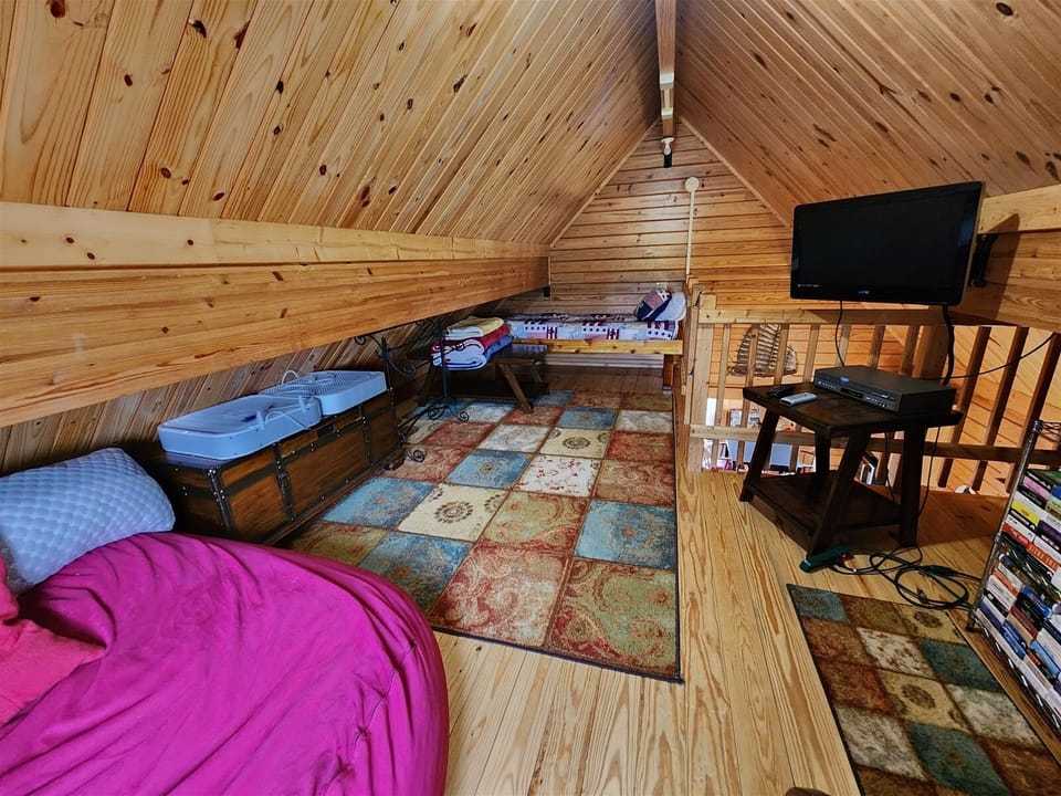 Loft with twin bed and a bean bag