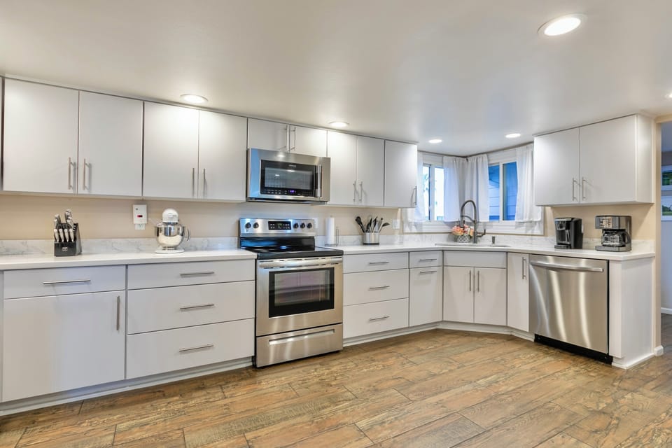 Fully stocked kitchen with Keurig Machine and drip coffee maker
