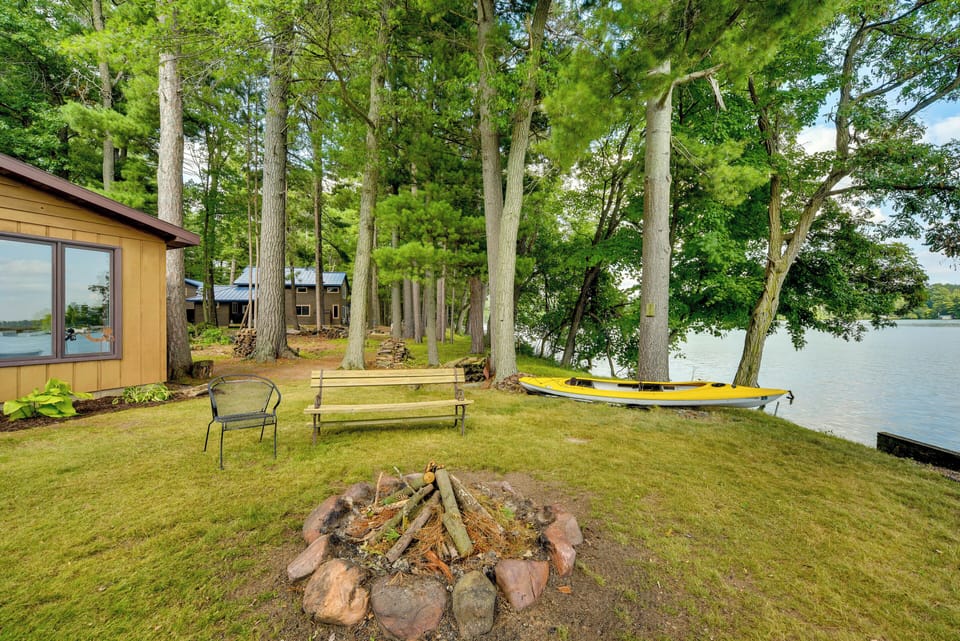 Cabin Exterior | Wood-Burning Fire Pit | Kayaks