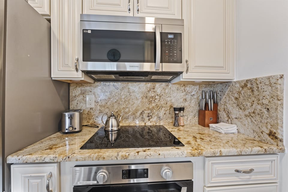 Stainless steal microwave. Glass top stove.