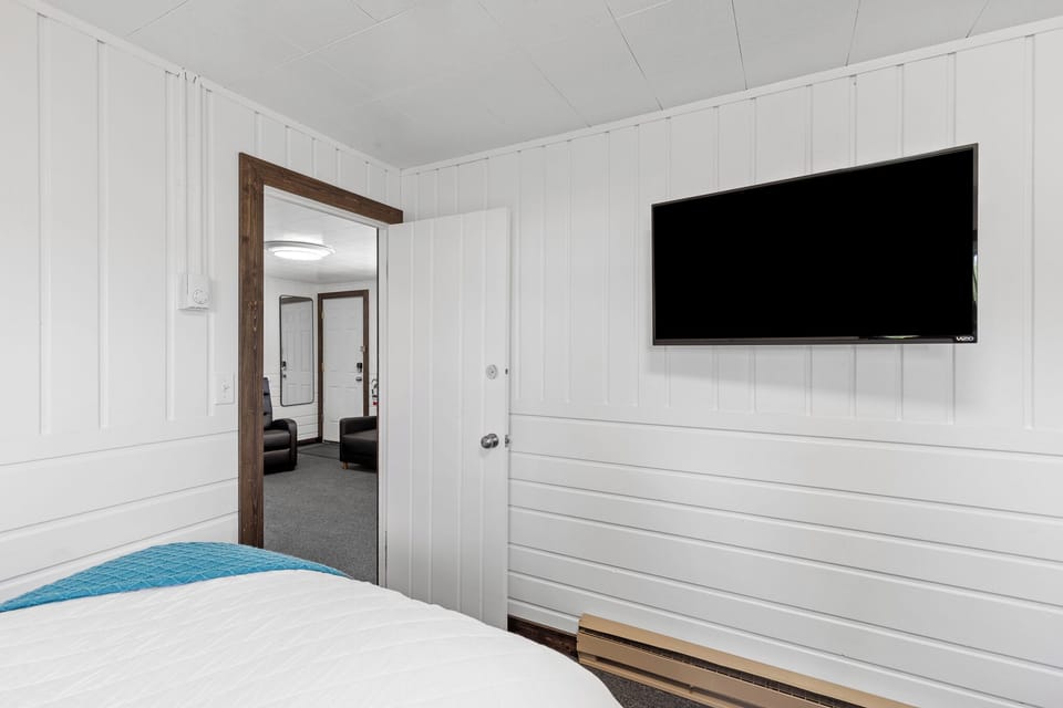 Guest room #2 with TV with view of living room