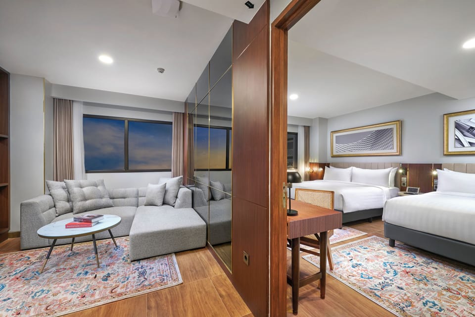 Family Suite | Living area | LED TV, smart speakers