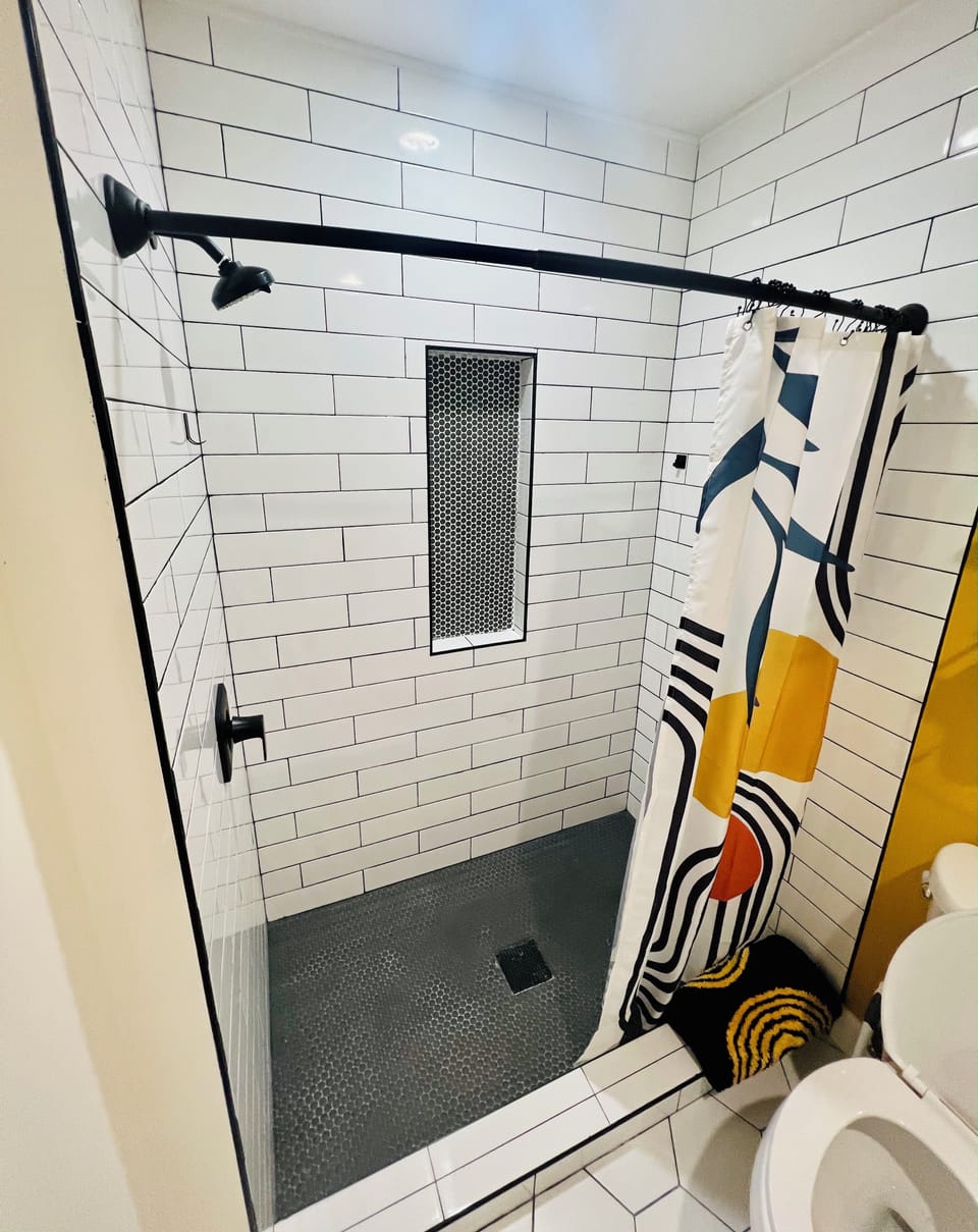 Large shower with shampoo and conditioner