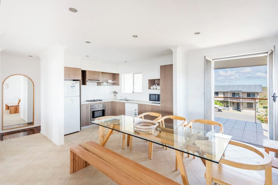 Beachies - Angourie accommodation with ocean views - Open plan kitchen, living & dining with ocean views