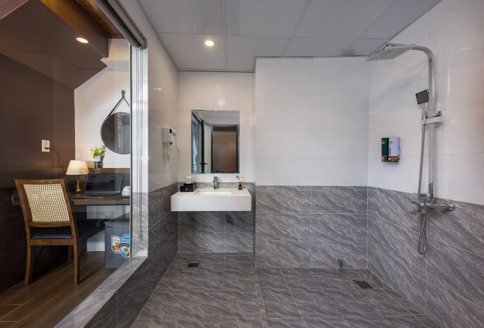 Premium Penthouse | Bathroom | Shower, hydromassage showerhead, designer toiletries, hair dryer