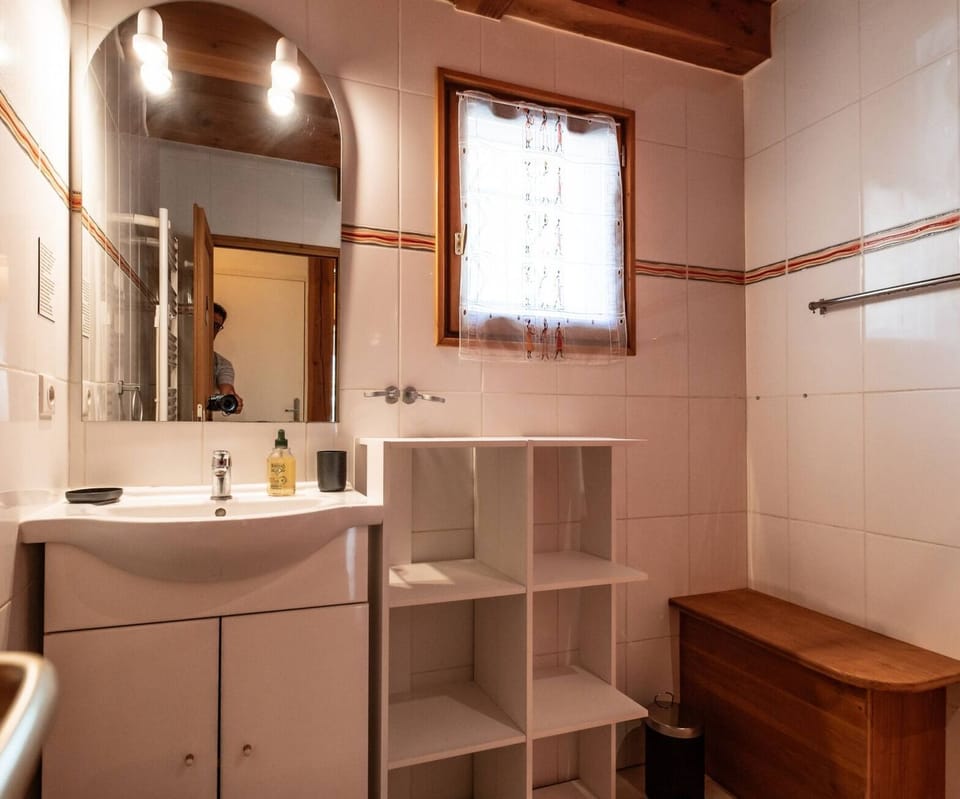 Bathroom with 90cm shower + washbasin + heated towel rail + hairdryer - towels provided.
