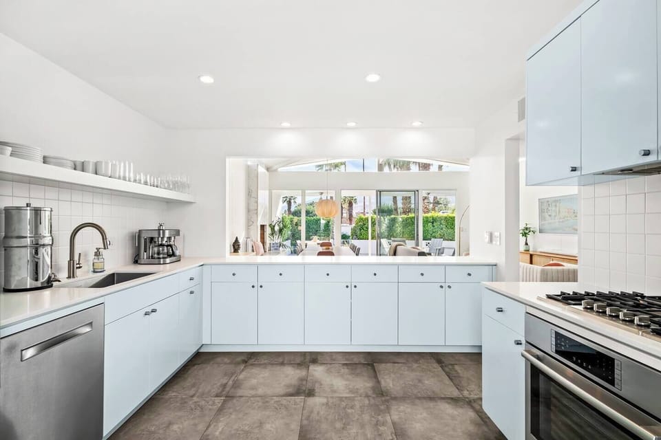 Spacious kitchen with quartz counters, stainless-steel appliances, and everything you need to whip up fabulous meals when you don't feel like eating out!