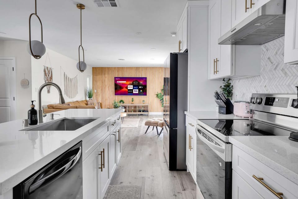 Open-concept living area with seamless flow from kitchen to living room.
