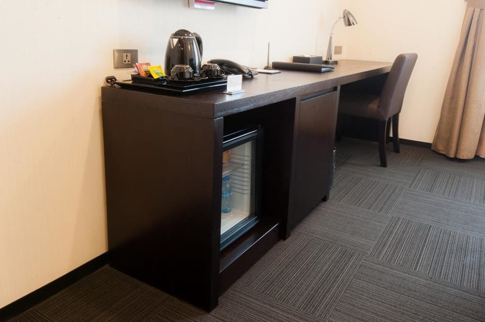Premium bedding, free minibar items, in-room safe, desk
