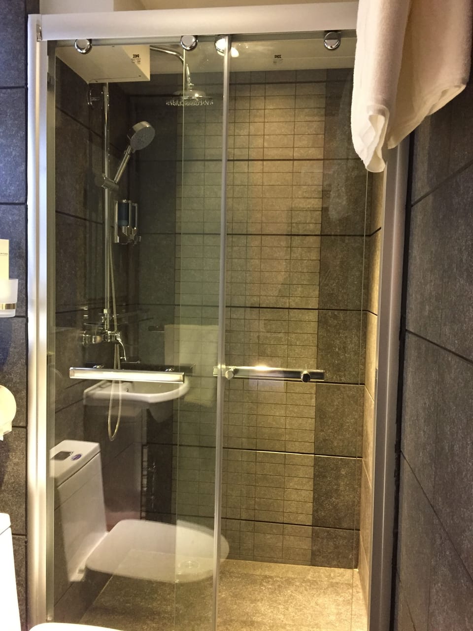 Shower, free toiletries, hair dryer, slippers