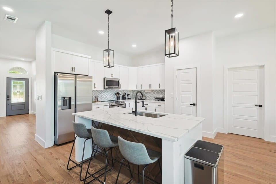 This dream kitchen was designed for creating lifelong memories surrounded by good food and even better company!