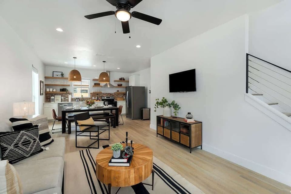 Spacious living room opens up to the kitchen and dining area.